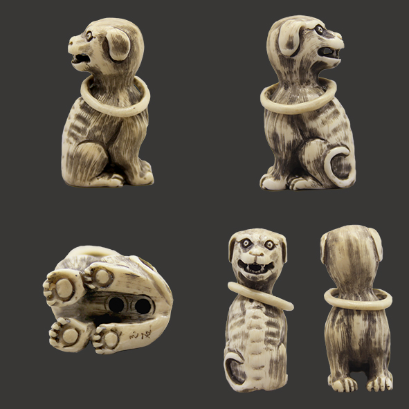 Netsuke Dog with a moving Ring around its Neck